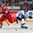 SOCHI, RUSSIA - APRIL 20: Russia's Ruzal Galeyev #9 eludes Finland's Saku Kinnunen #23 during preliminary round action at the 2013 IIHF Ice Hockey U18 World Championship. (Photo by Francois Laplante/HHOF-IIHF Images)